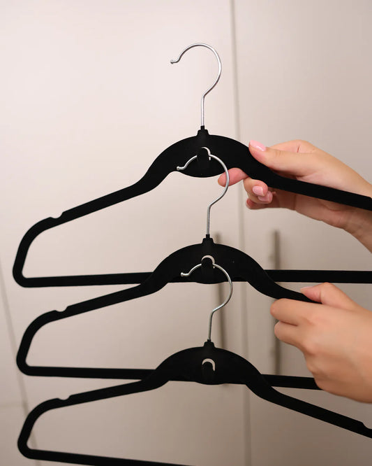 Thin velvet hangers stacked