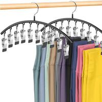 Legging hanger holding leggings by their clips, four come in The Family Closet Set
