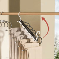 Close up of the pants hanger top bar swinging open